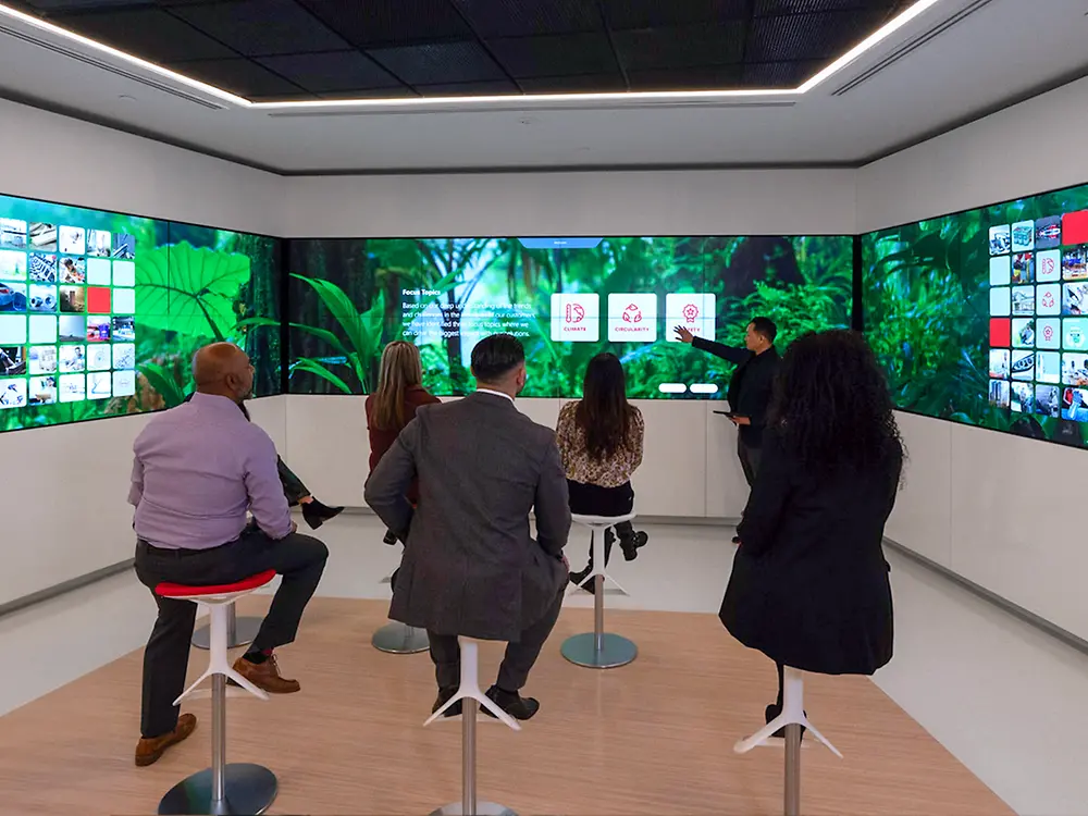 Guests sitting in the Infinity Room during a tour of the TCB.